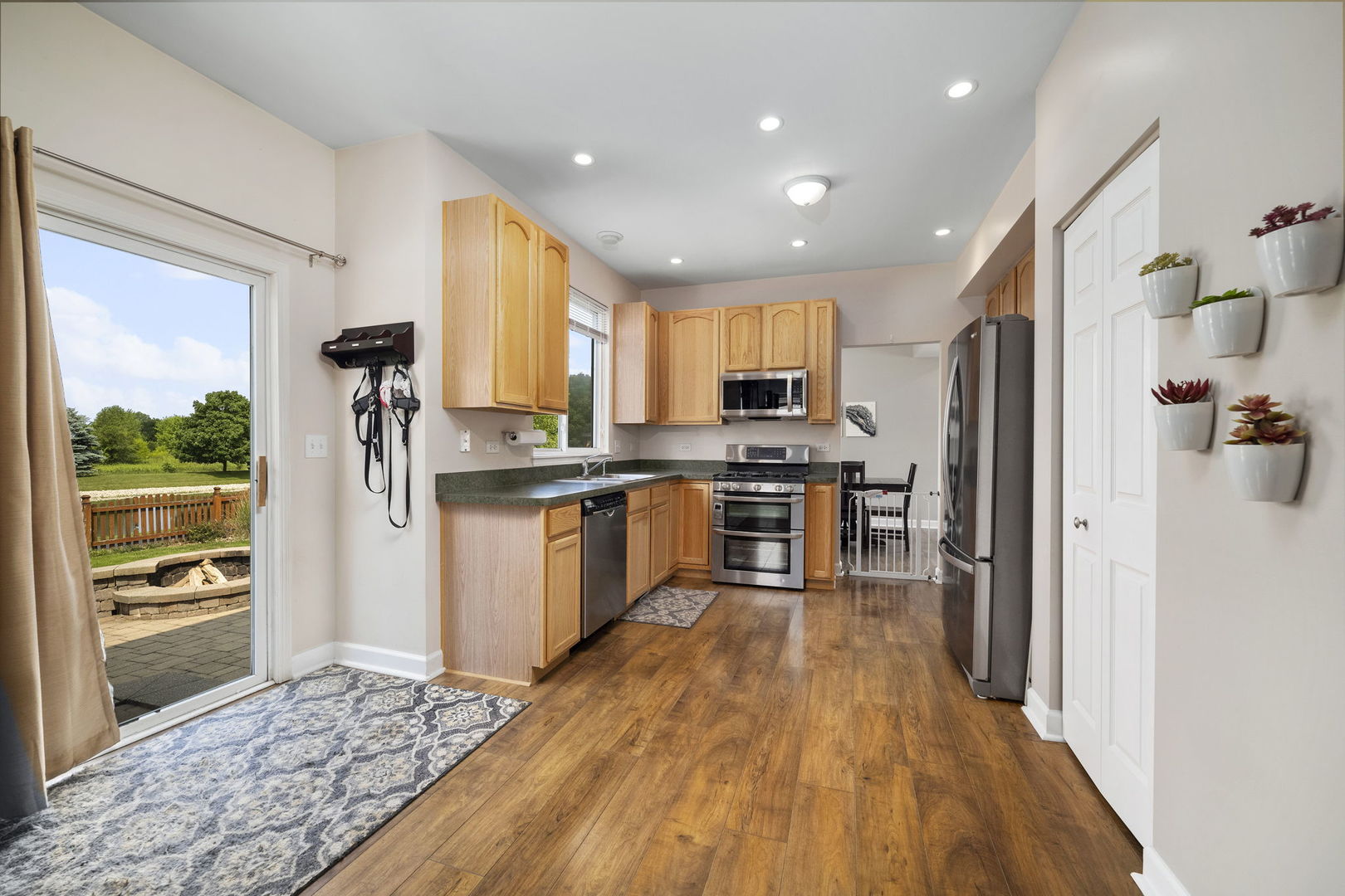 3815 Cherry Tree Lane Joliet, IL 60435 - Photo 15 of 37 a kitchen with stainless steel appliances a refrigerator and a stove top oven