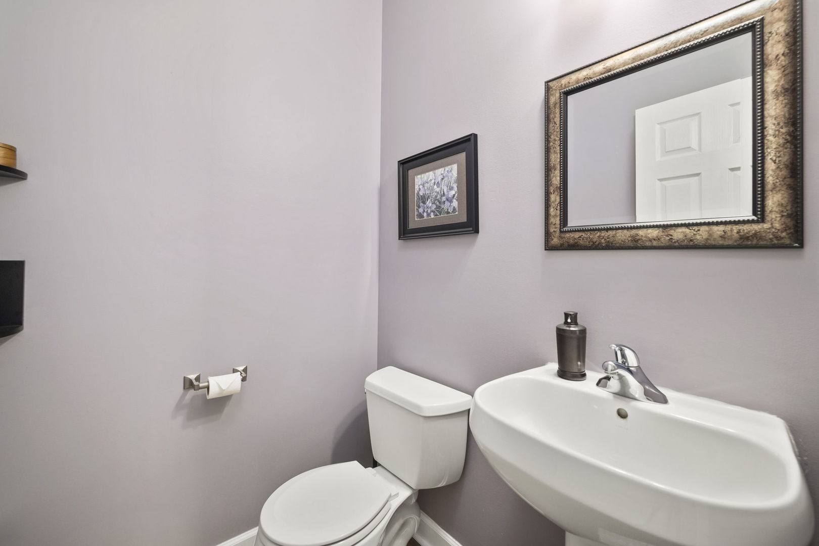 3815 Cherry Tree Lane Joliet, IL 60435 - Photo 18 of 37 a bathroom with a toilet a sink and mirror