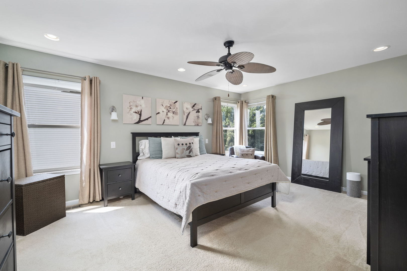3815 Cherry Tree Lane Joliet, IL 60435 - Photo 20 of 37 a bedroom with a large bed a flat tv screen and closet