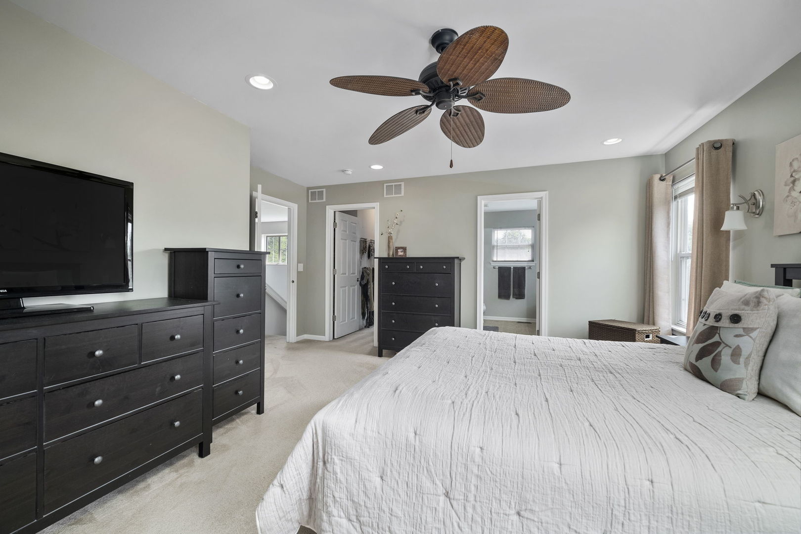 3815 Cherry Tree Lane Joliet, IL 60435 - Photo 21 of 37 a bedroom with a bed and a flat screen tv