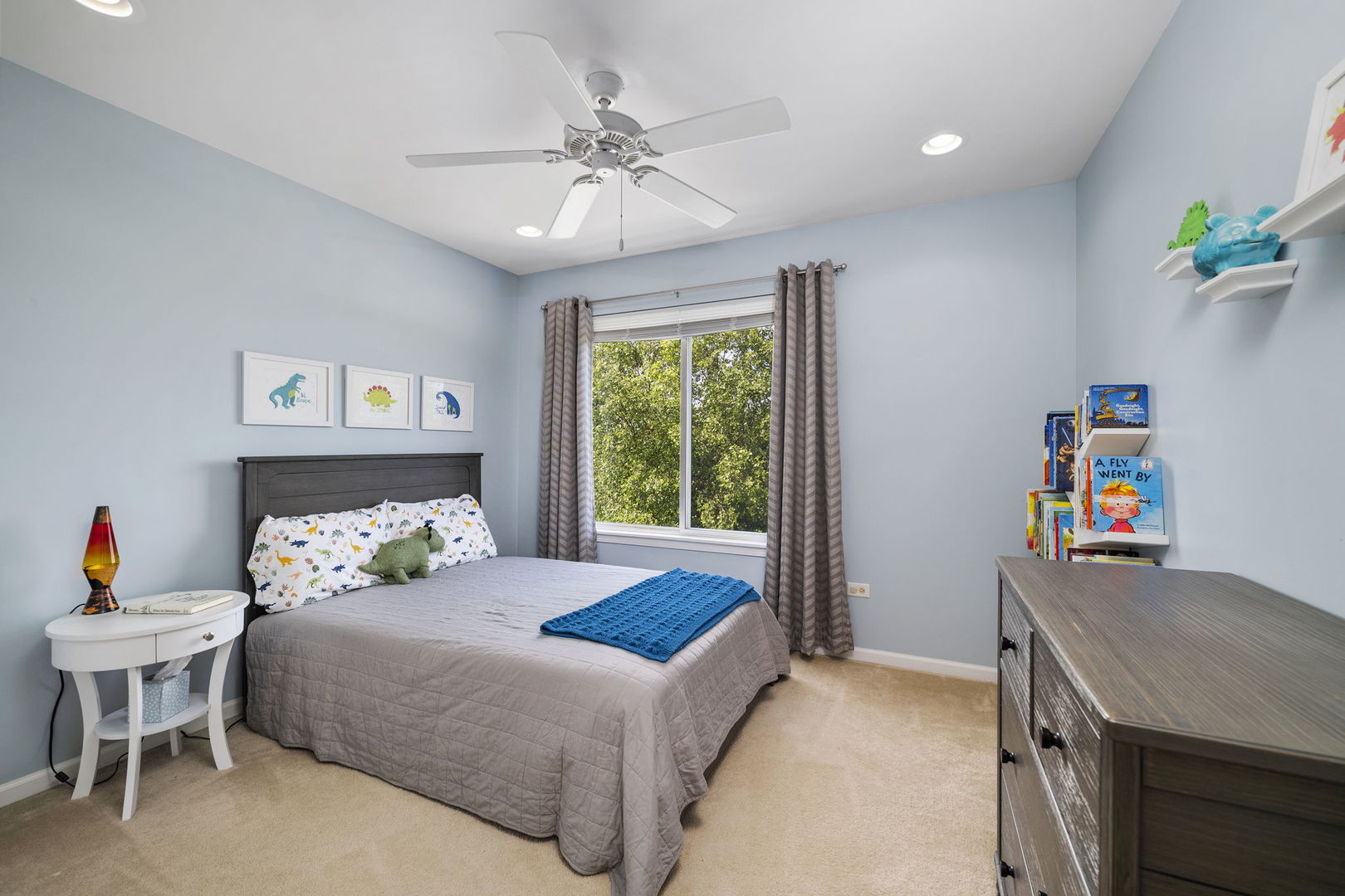 3815 Cherry Tree Lane Joliet, IL 60435 - Photo 24 of 37 a bedroom with a bed and a table