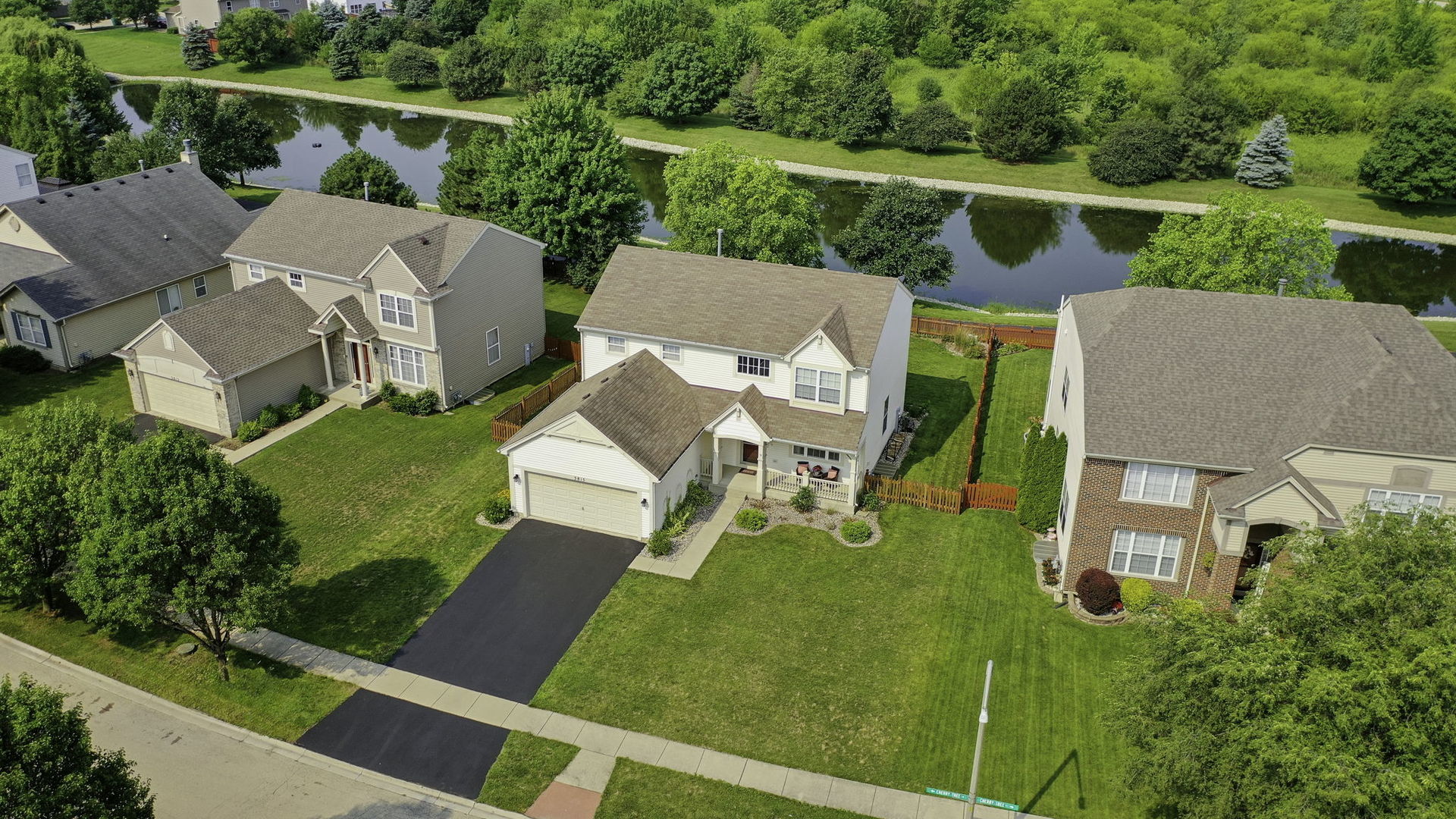 3815 Cherry Tree Lane Joliet, IL 60435 - Photo 3 of 37 an aerial view of a house with garden space and street view