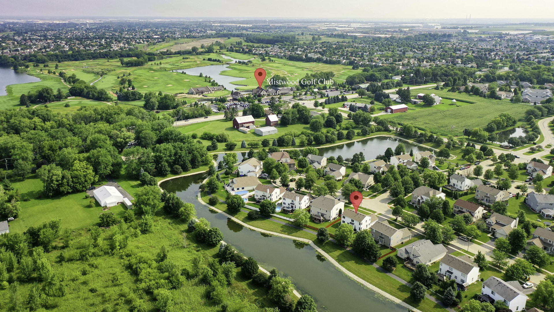 3815 Cherry Tree Lane Joliet, IL 60435 - Photo 36 of 37 a view of a city with lush green forest