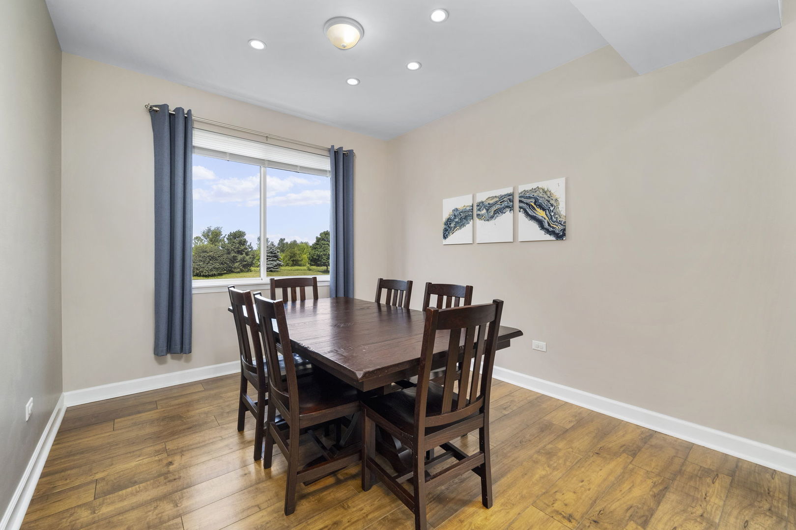 3815 Cherry Tree Lane Joliet, IL 60435 - Photo 9 of 37 a view of a dining room with furniture and wooden floor