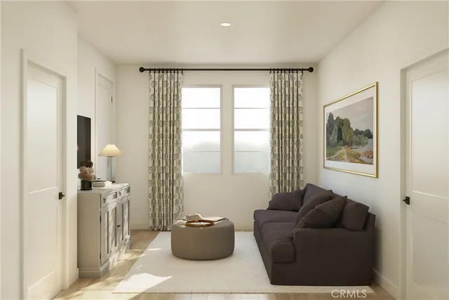 a bedroom with a bed and a night stand