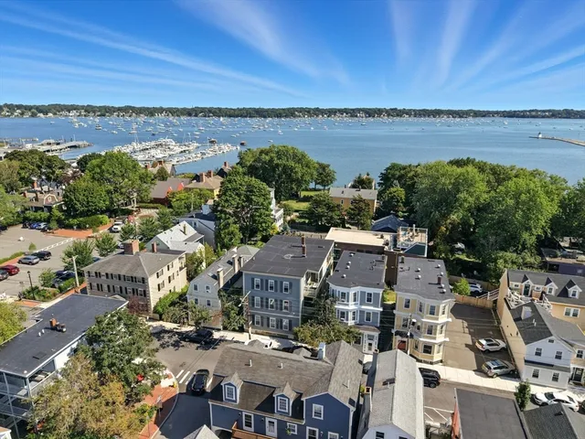 an aerial view of a house with a garden