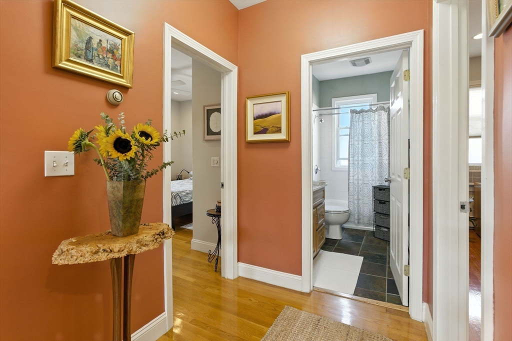 131 Derby Street, Unit 3F Salem, MA 01970 - Photo 19 of 37 view of a bathroom with a glass door