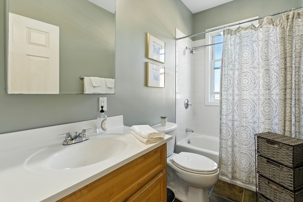 131 Derby Street, Unit 3F Salem, MA 01970 - Photo 26 of 37 a bathroom with a sink toilet and shower