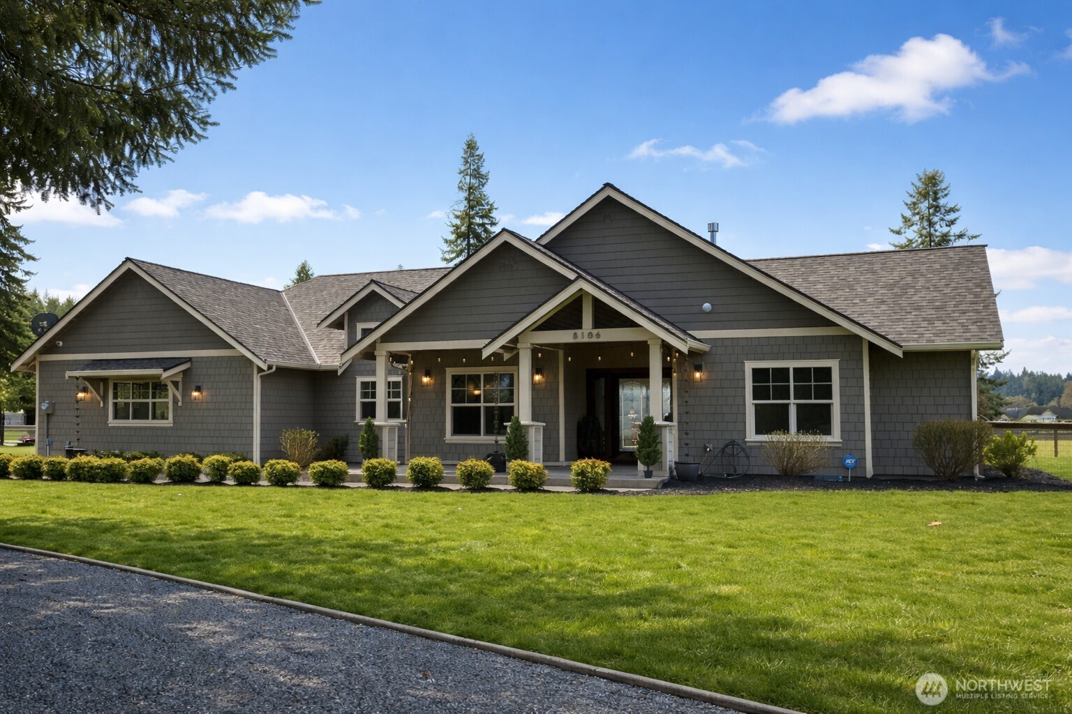 8106 Spurgeon Creek Road Southeast Olympia, WA 98513 - Photo 2 of 29 a front view of house with yard and green space