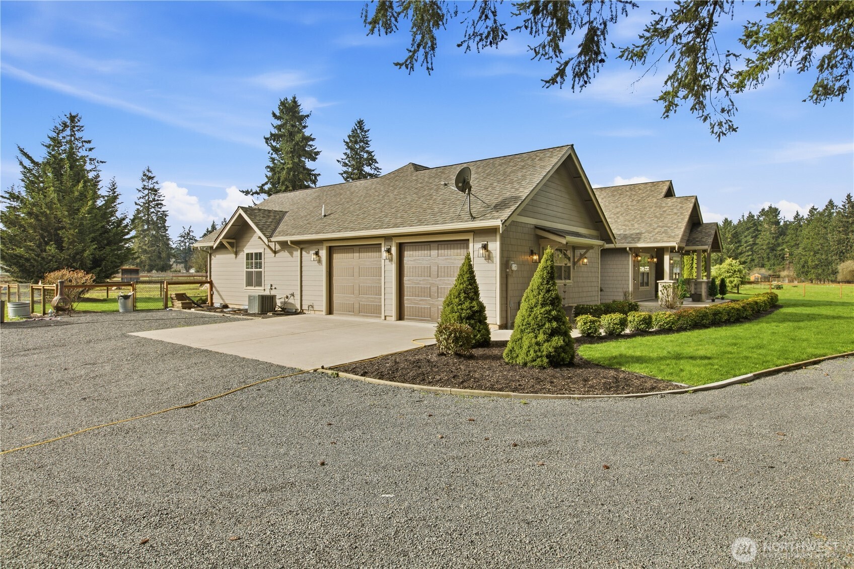 8106 Spurgeon Creek Road Southeast Olympia, WA 98513 - Photo 22 of 29 a front view of a house with a yard