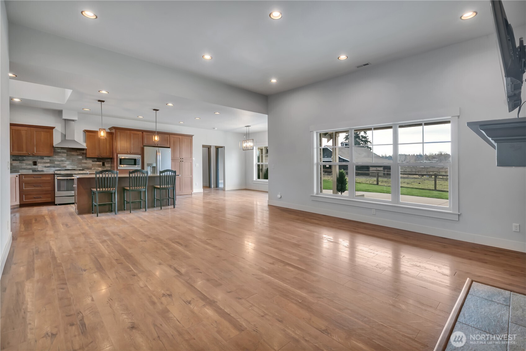 8106 Spurgeon Creek Road Southeast Olympia, WA 98513 - Photo 6 of 29 a view of a kitchen with a sink and a large window
