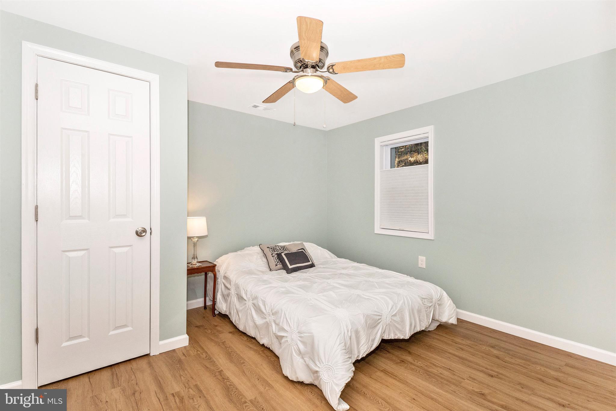 417 Twin Arch Road Mount Airy, MD 21771 - Photo 23 of 59 Bedroom #1 offers a Cozy View of the woods outside