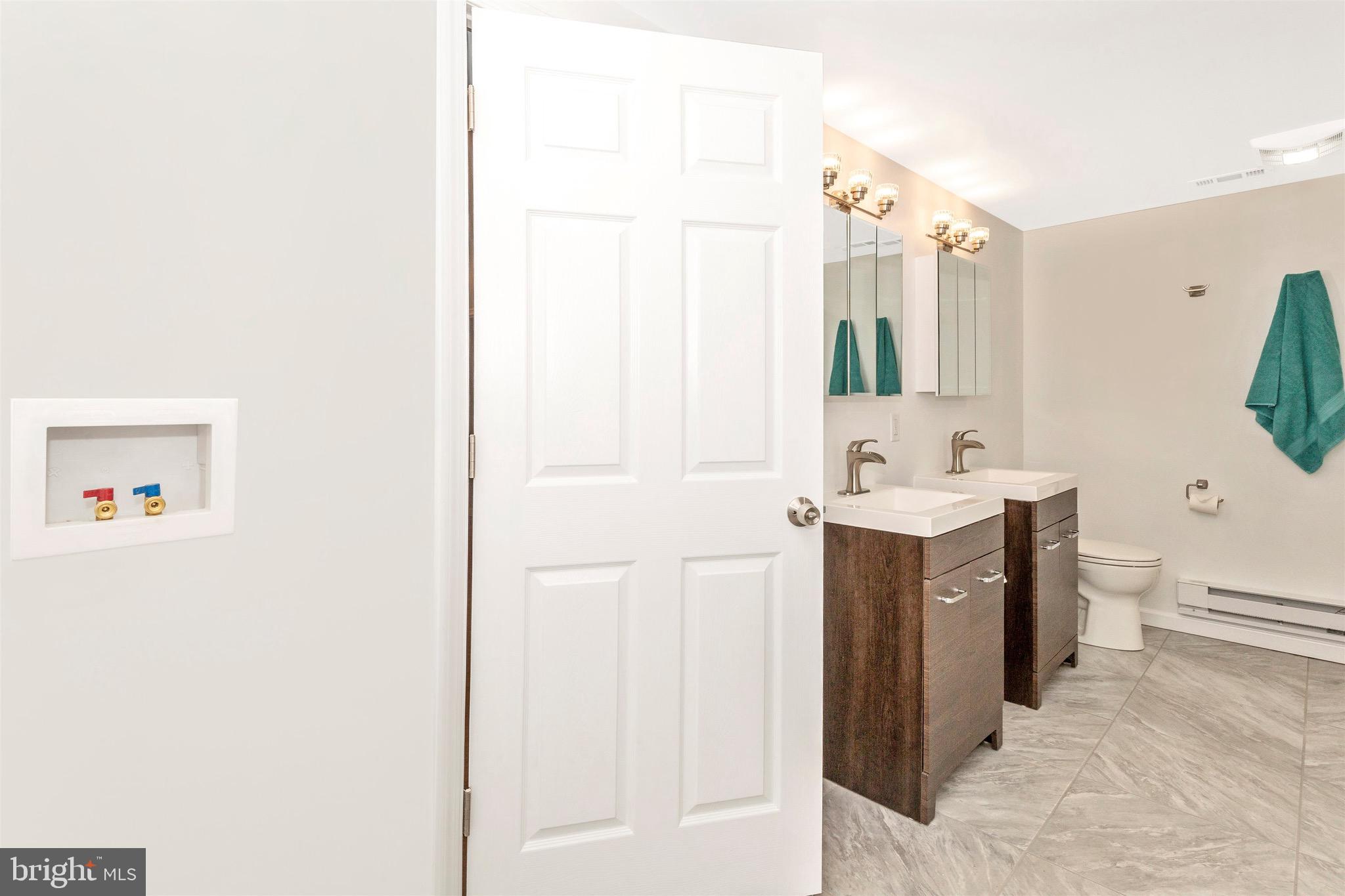 417 Twin Arch Road Mount Airy, MD 21771 - Photo 32 of 59 Laundry Area Conveniently Located in Bathroom