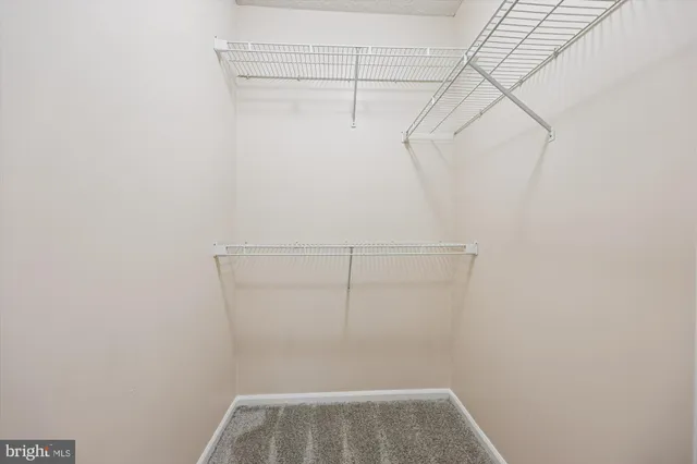 a backyard of a house with outdoor seating