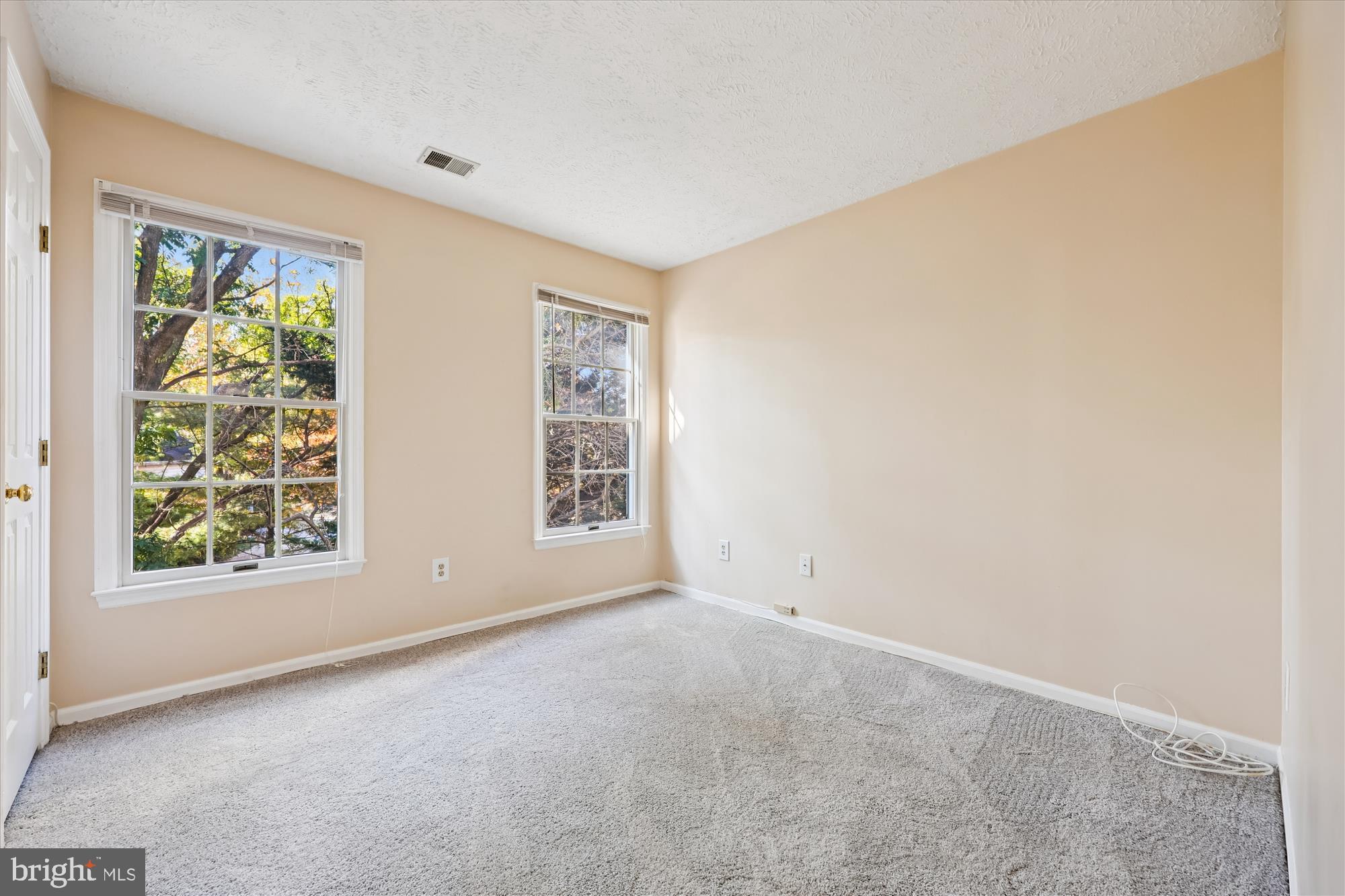 13114 Briarcliff Terrace, Unit 407 Germantown, MD 20874 - Photo 27 of 77 an empty room with windows