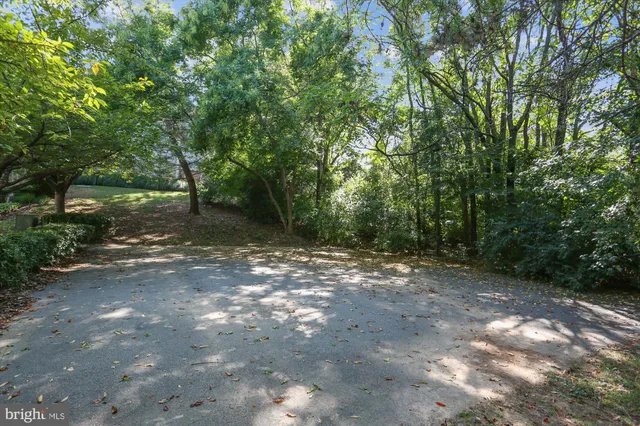 a view of a golf course with a house
