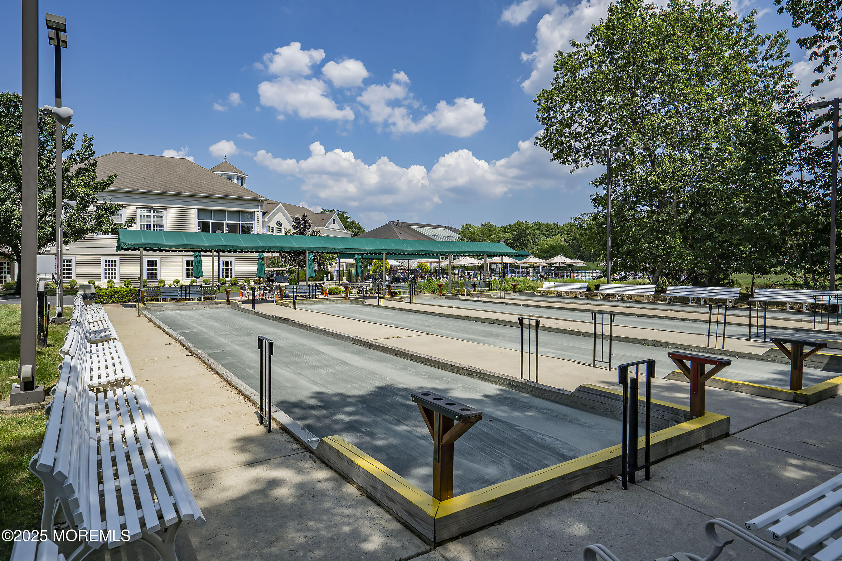 12 Rye Court Jackson, NJ 08527 - Photo 31 of 38 a view of a swimming pool with seating space and deck