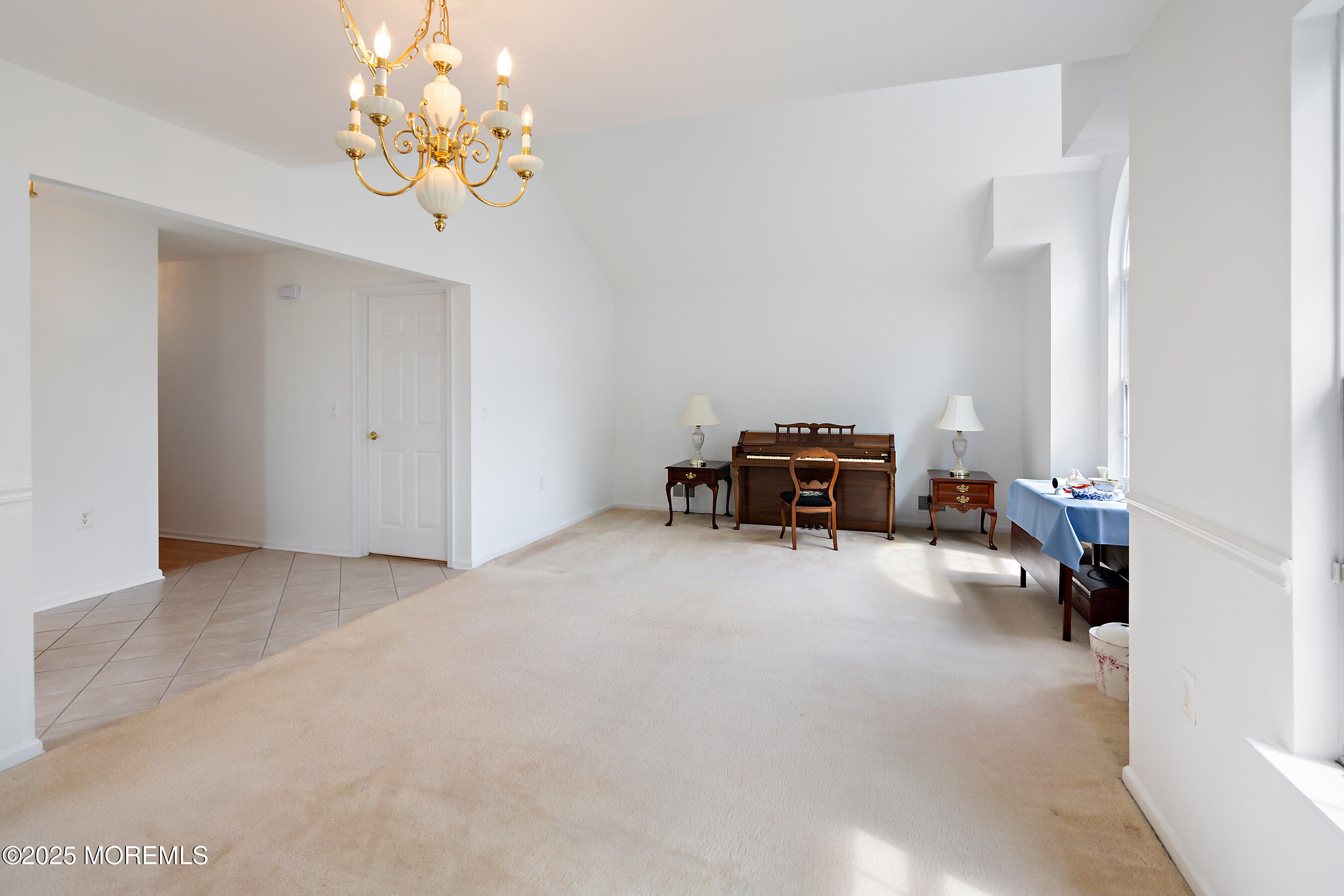 12 Rye Court Jackson, NJ 08527 - Photo 5 of 38 a view of a livingroom with furniture and chandelier