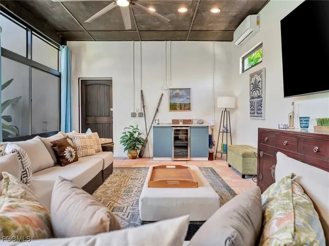 a view of a chairs and table in front of a house