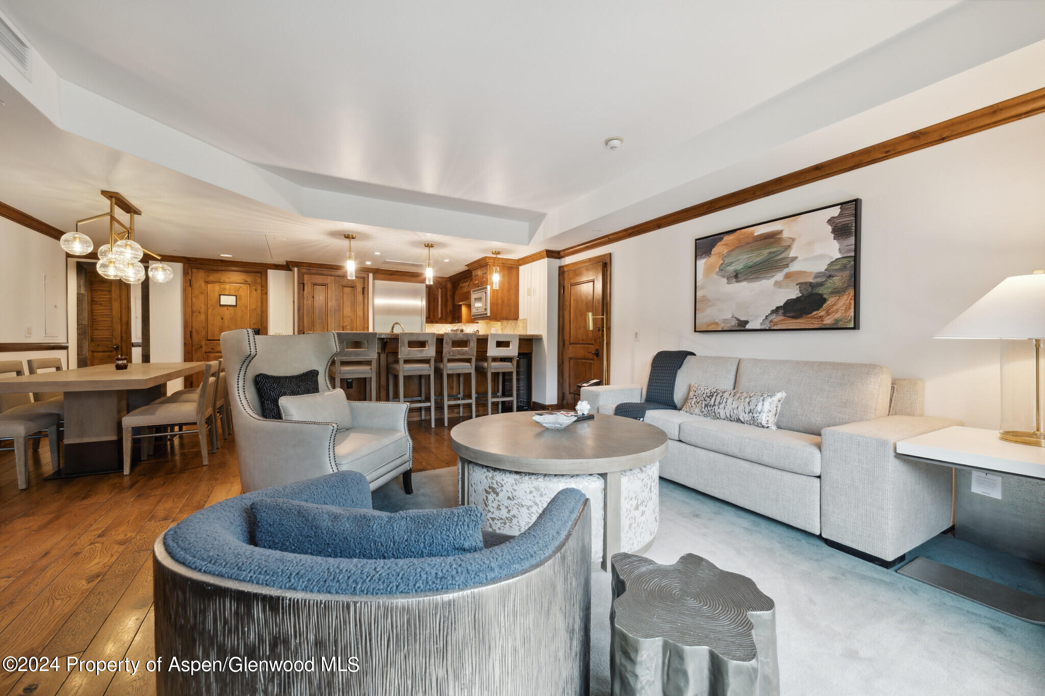 415 East Dean St Unit 22 Week 6 Aspen, CO 81611 - Photo 7 of 25 a living room with furniture and a dining table