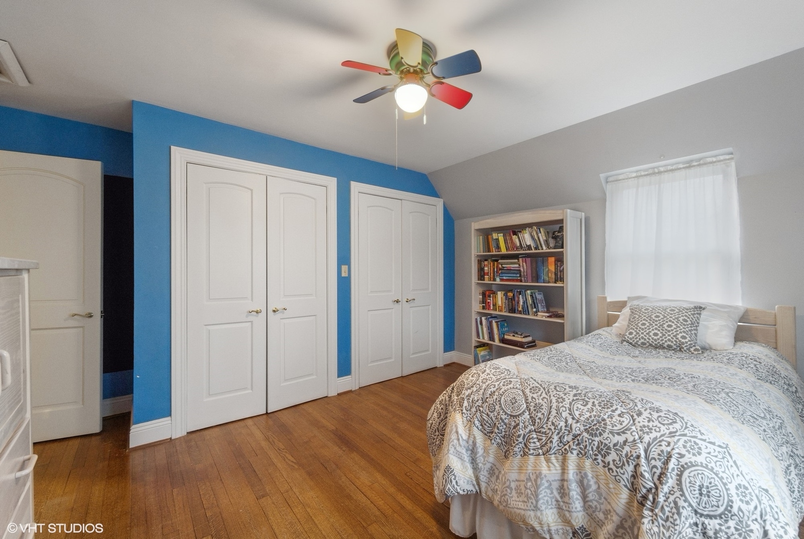 1435 Monroe Avenue River Forest, IL 60305 - Photo 22 of 38 a bedroom with a large bed and a chandelier