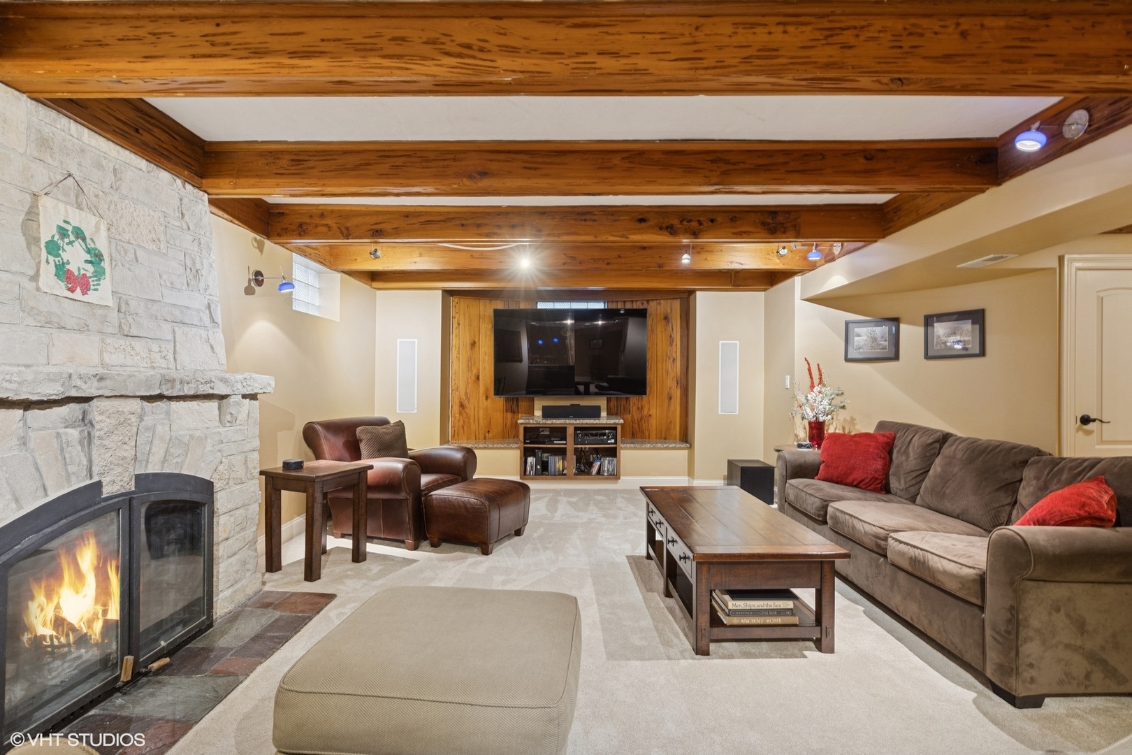 1435 Monroe Avenue River Forest, IL 60305 - Photo 27 of 38 a living room with furniture a fireplace and a flat screen tv