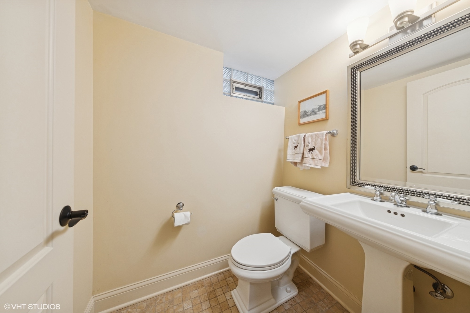 1435 Monroe Avenue River Forest, IL 60305 - Photo 31 of 38 a bathroom with a sink mirror vanity and toilet