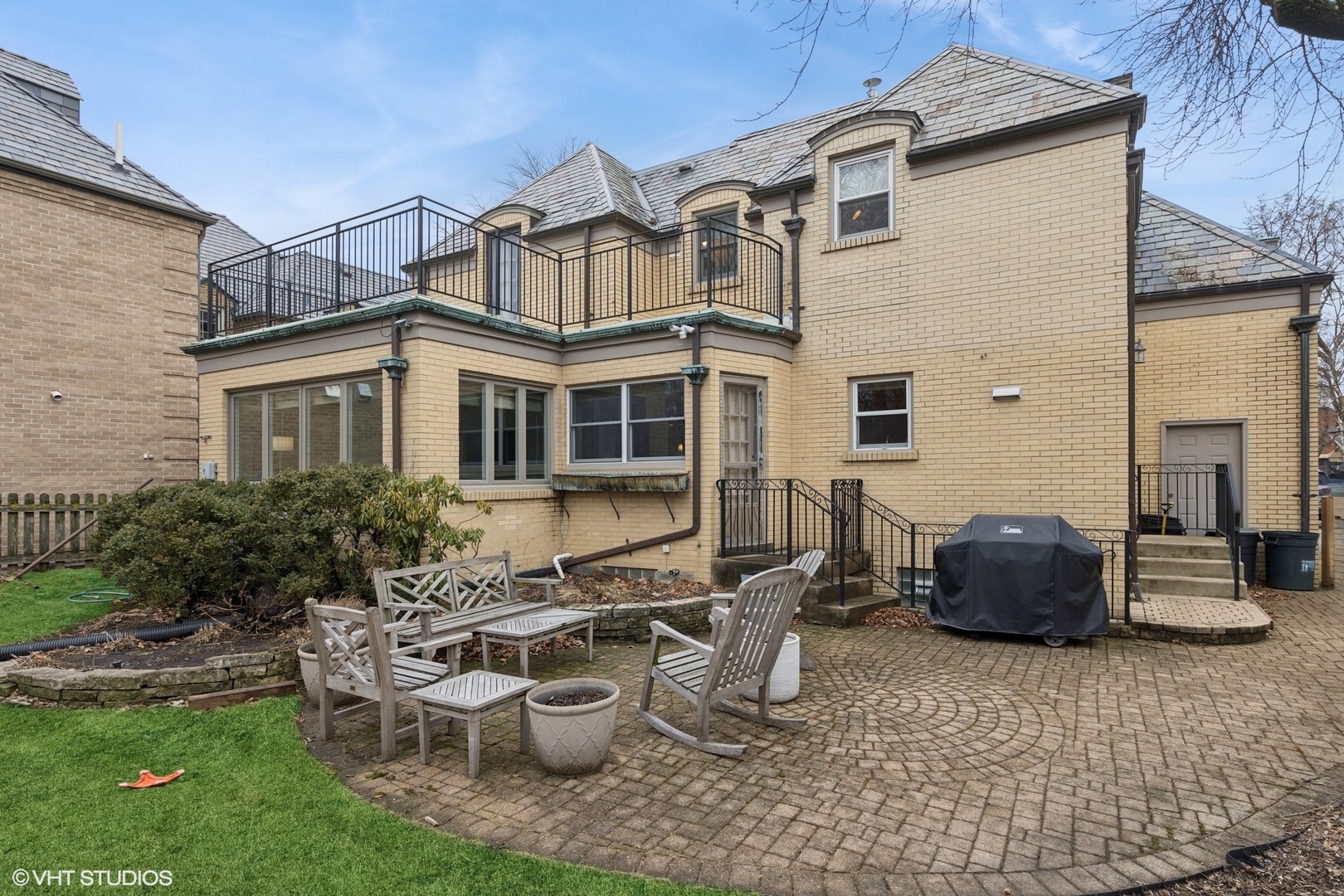 1435 Monroe Avenue River Forest, IL 60305 - Photo 32 of 38 a view of a patio with table and chairs potted plants and a large tree