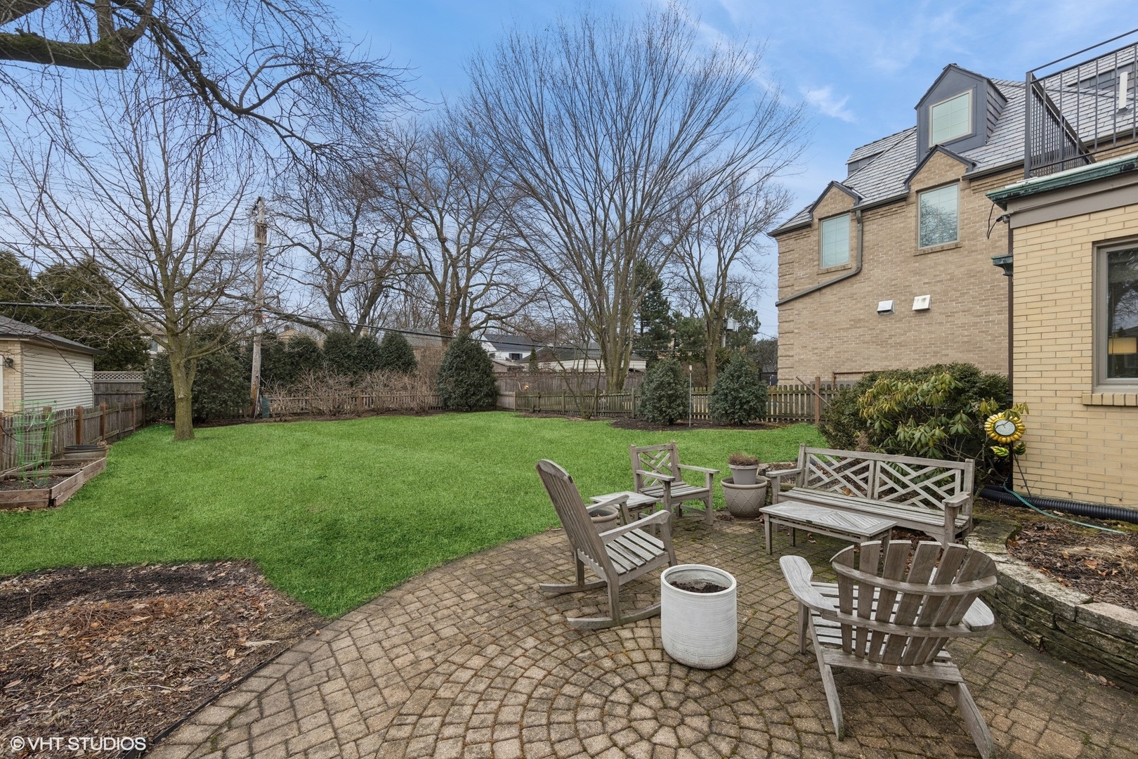 1435 Monroe Avenue River Forest, IL 60305 - Photo 33 of 38 a view of a patio with table and chairs potted plants and large tree