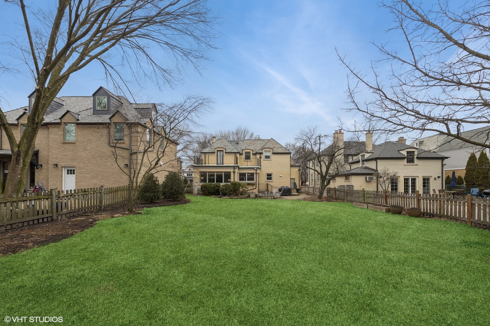 1435 Monroe Avenue River Forest, IL 60305 - Photo 34 of 38 a view of a white house next to a yard with large trees