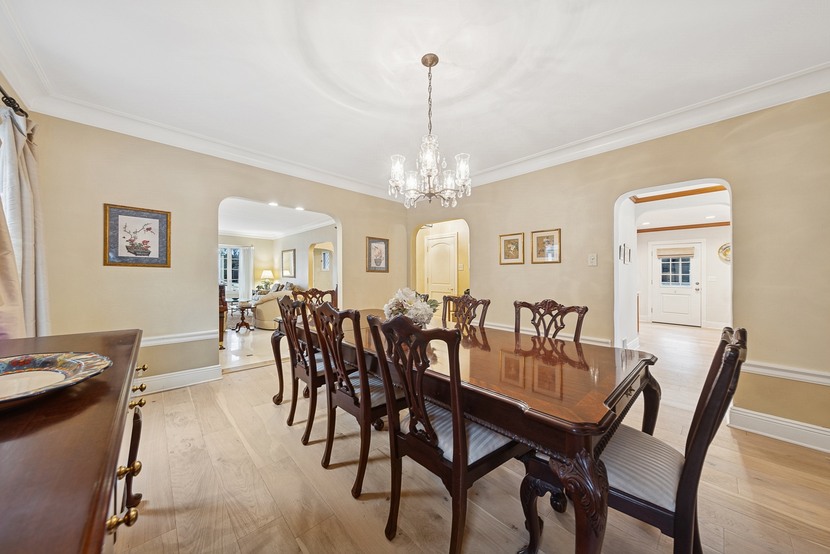1435 Monroe Avenue River Forest, IL 60305 - Photo 7 of 38 a view of a dining room with furniture and chandelier