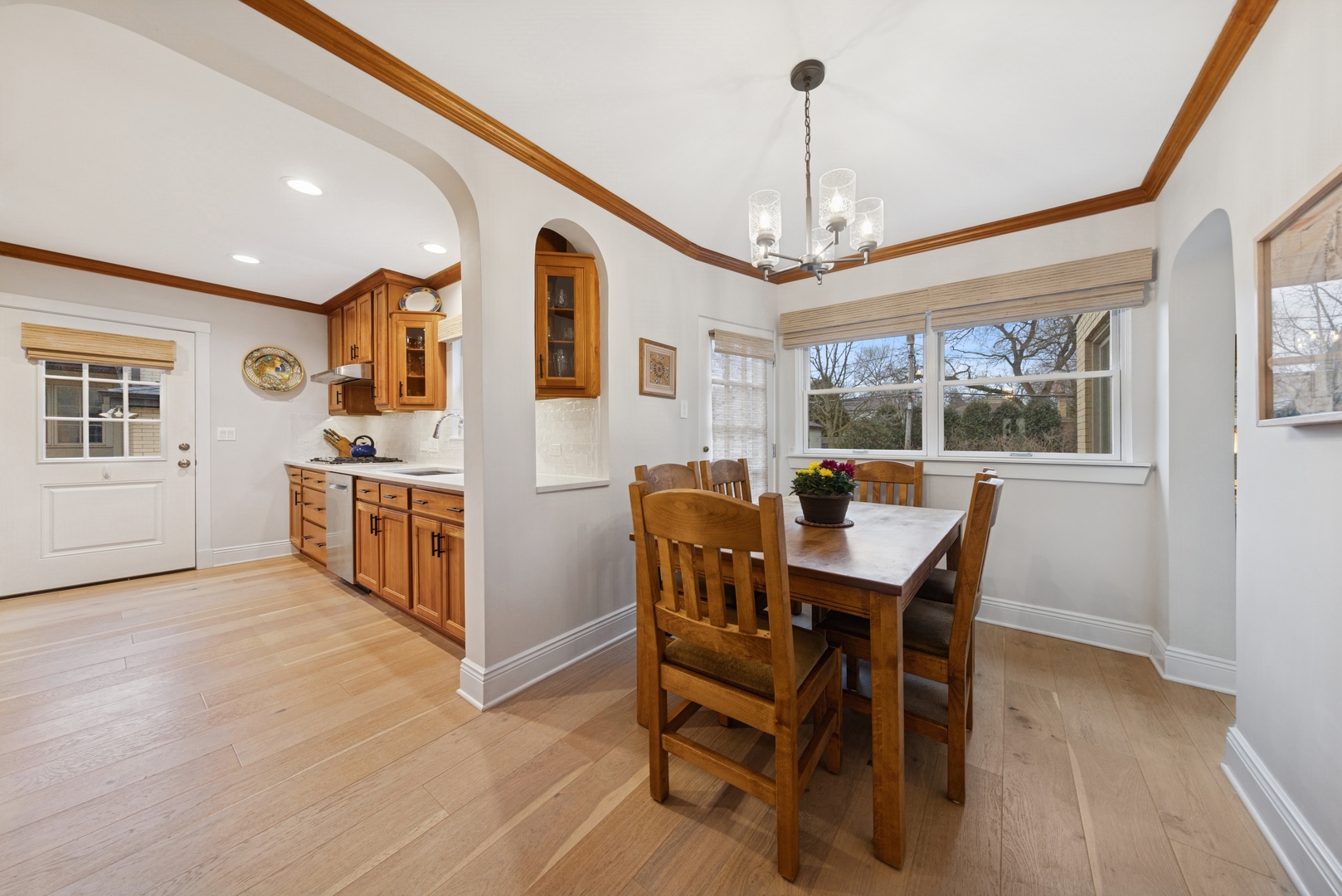 1435 Monroe Avenue River Forest, IL 60305 - Photo 9 of 38 a view of a dining room with furniture window and wooden floor