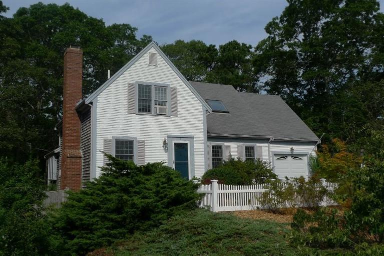 3 Princess Path East Dennis, MA 02660 - Photo 16 of 32 a view of house with a yard and a garden