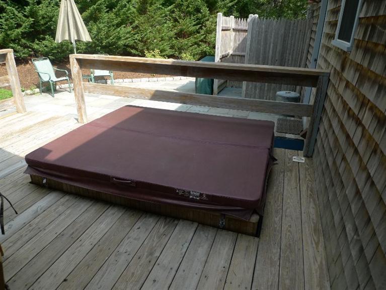 3 Princess Path East Dennis, MA 02660 - Photo 21 of 32 a backyard of a house with wooden floor and outdoor seating