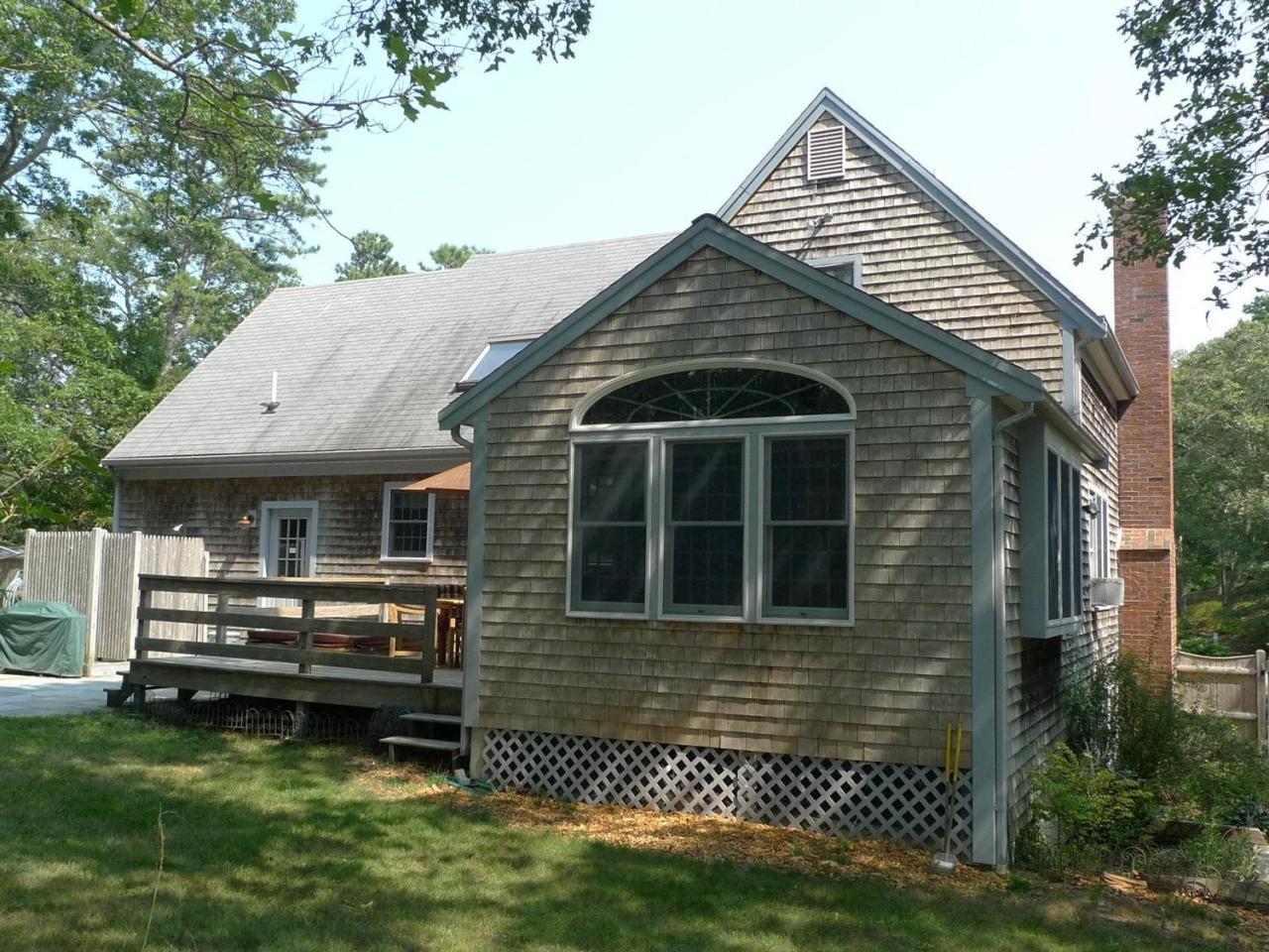3 Princess Path East Dennis, MA 02660 - Photo 27 of 32 a view of a house with a yard