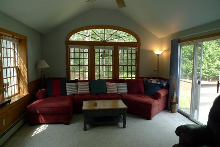 3 Princess Path East Dennis, MA 02660 - Photo 6 of 32 a living room with furniture and a floor to ceiling window