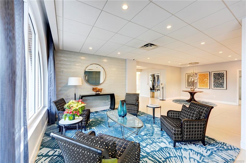 1180 South Ocean Boulevard, Unit 8B Boca Raton, FL 33432 - Photo 17 of 62 a living room with furniture and wooden floor