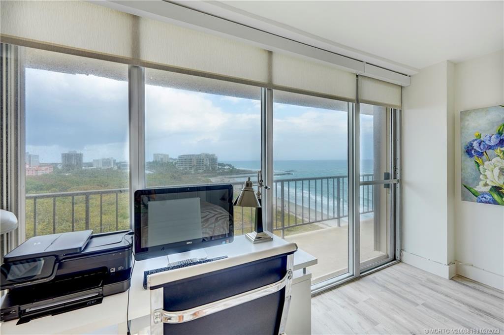 1180 South Ocean Boulevard, Unit 8B Boca Raton, FL 33432 - Photo 55 of 62 a bedroom with a bed and a balcony