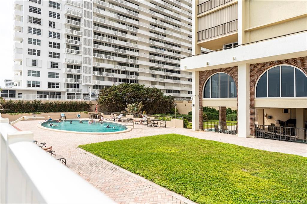 1180 South Ocean Boulevard, Unit 8B Boca Raton, FL 33432 - Photo 8 of 62 a view of a building with garden