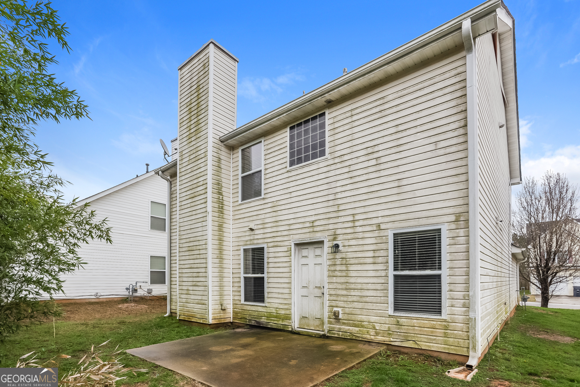5002 Serenity Point Lane Villa Rica, GA 30180 - Photo 15 of 17 a front view of a house with a yard