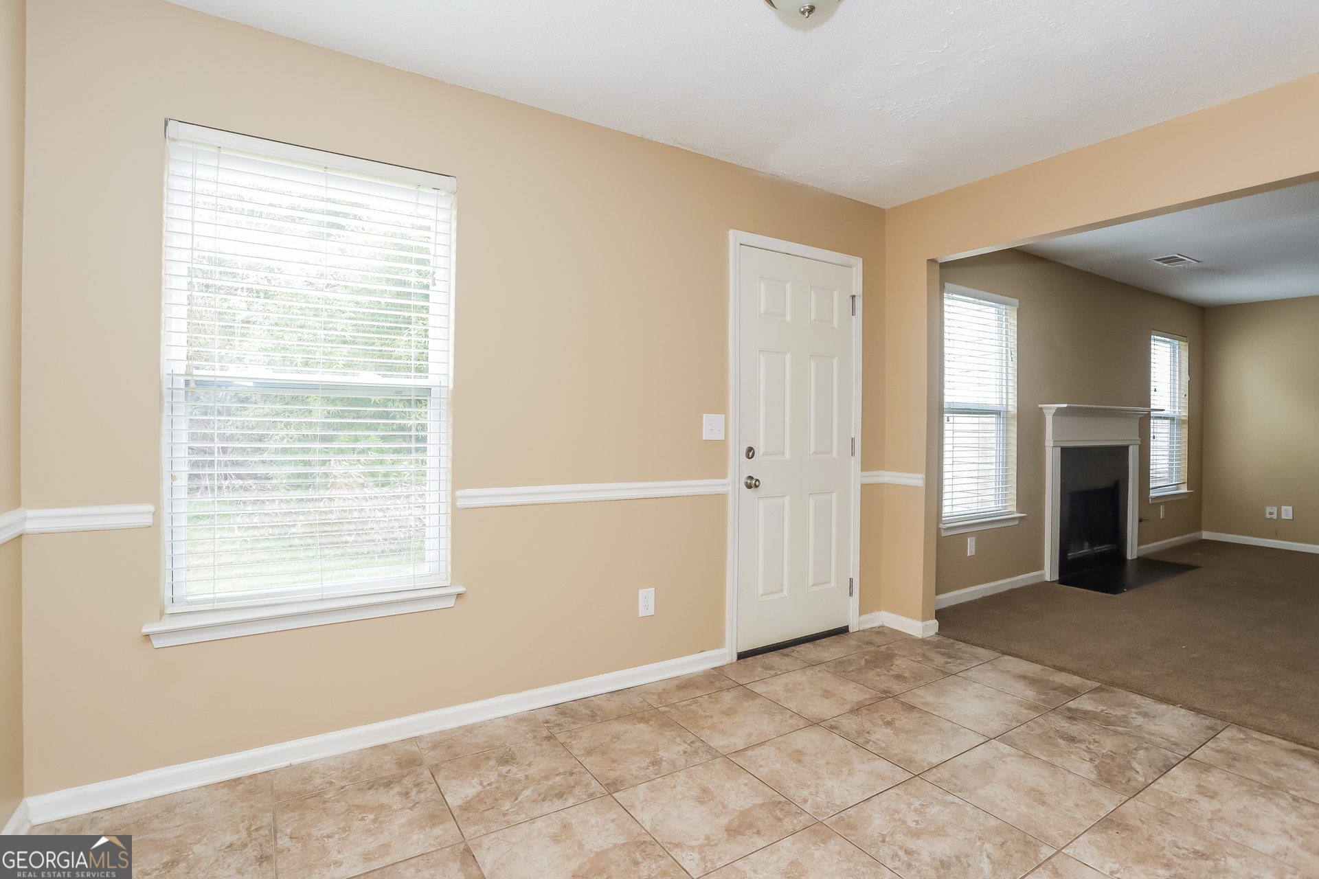 5002 Serenity Point Lane Villa Rica, GA 30180 - Photo 4 of 17 a view of an empty room with closet and a window