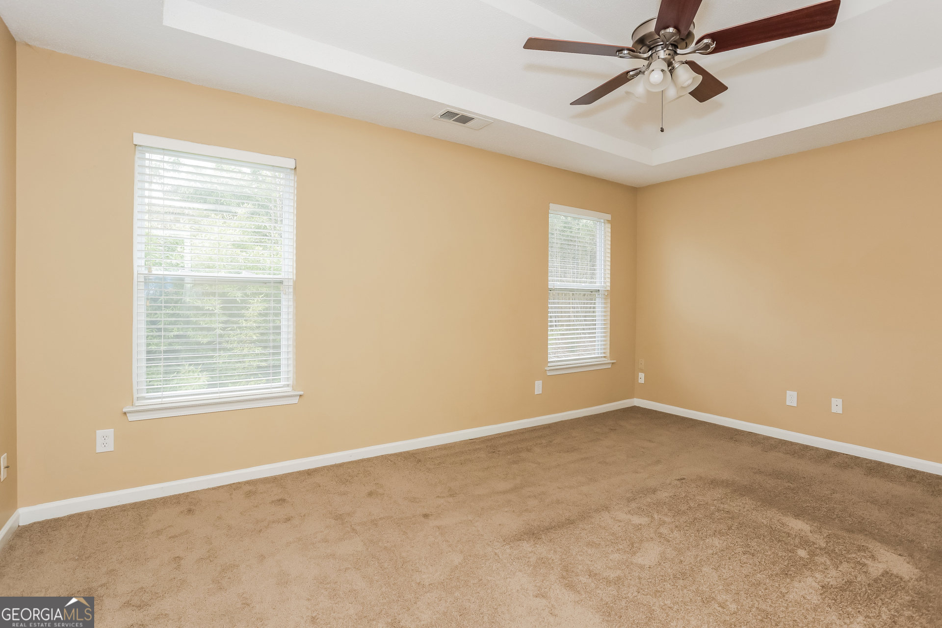 5002 Serenity Point Lane Villa Rica, GA 30180 - Photo 6 of 17 a view of an empty room with a window