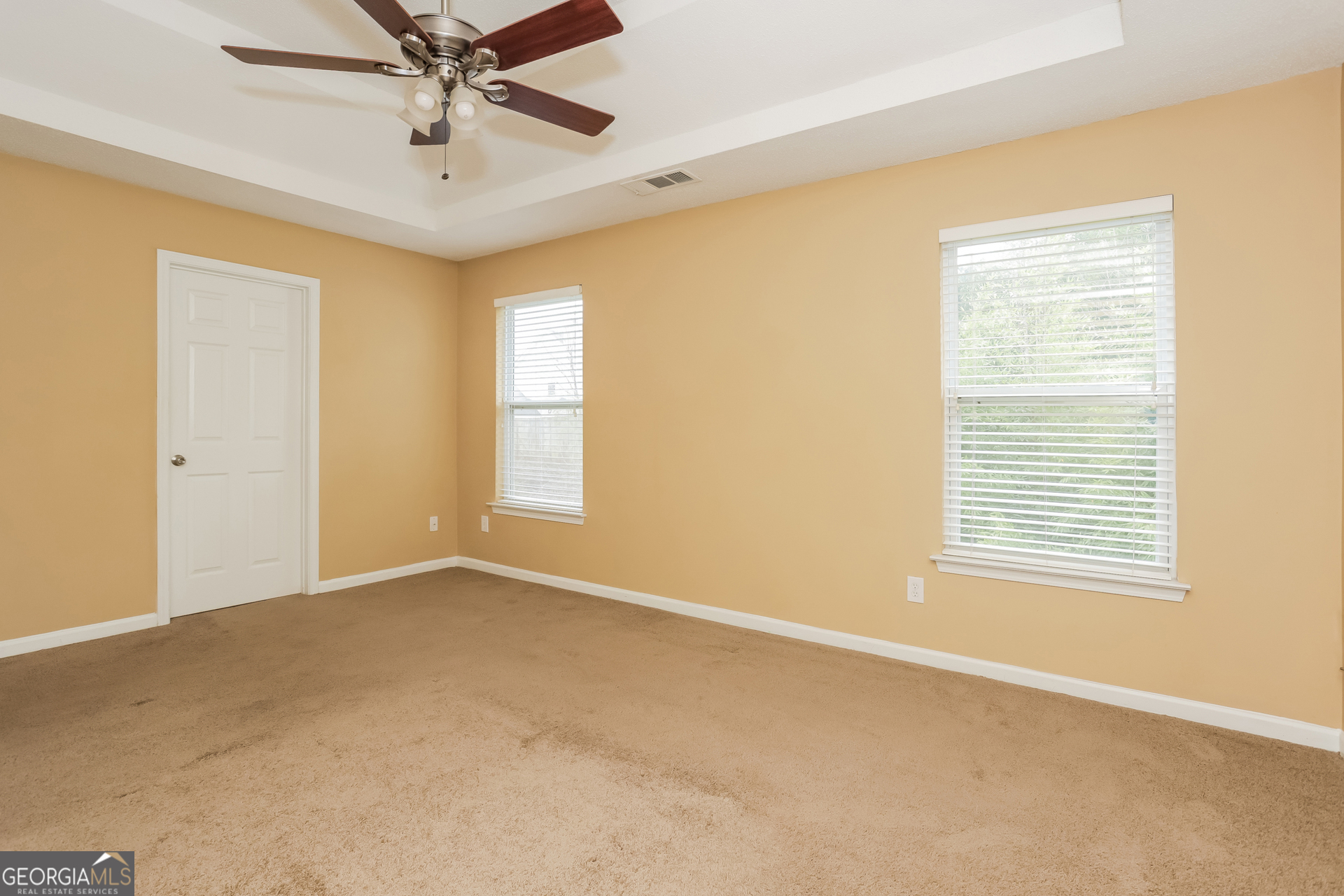 5002 Serenity Point Lane Villa Rica, GA 30180 - Photo 7 of 17 a view of an empty room with a window