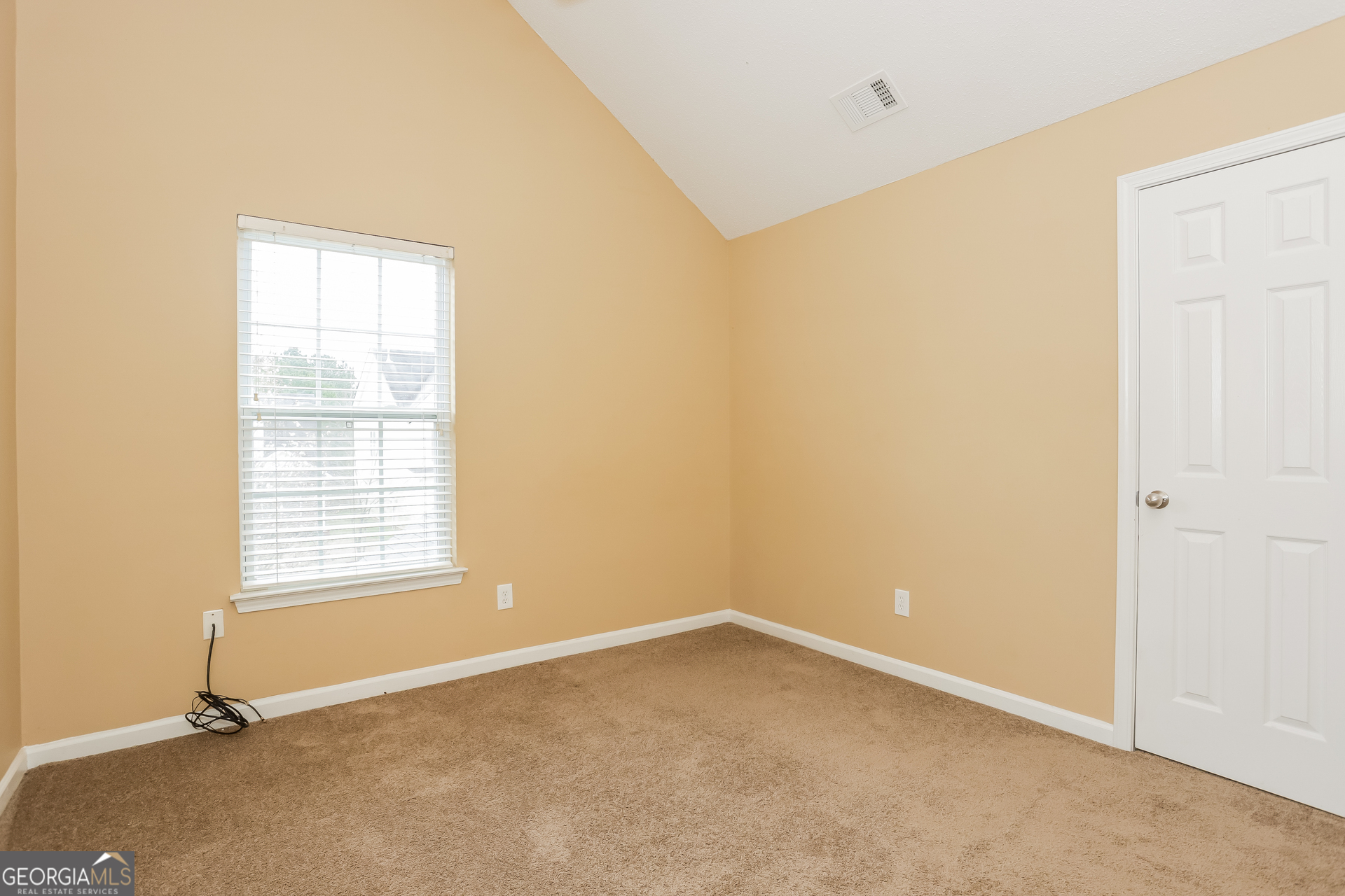5002 Serenity Point Lane Villa Rica, GA 30180 - Photo 10 of 17 an empty room with a window
