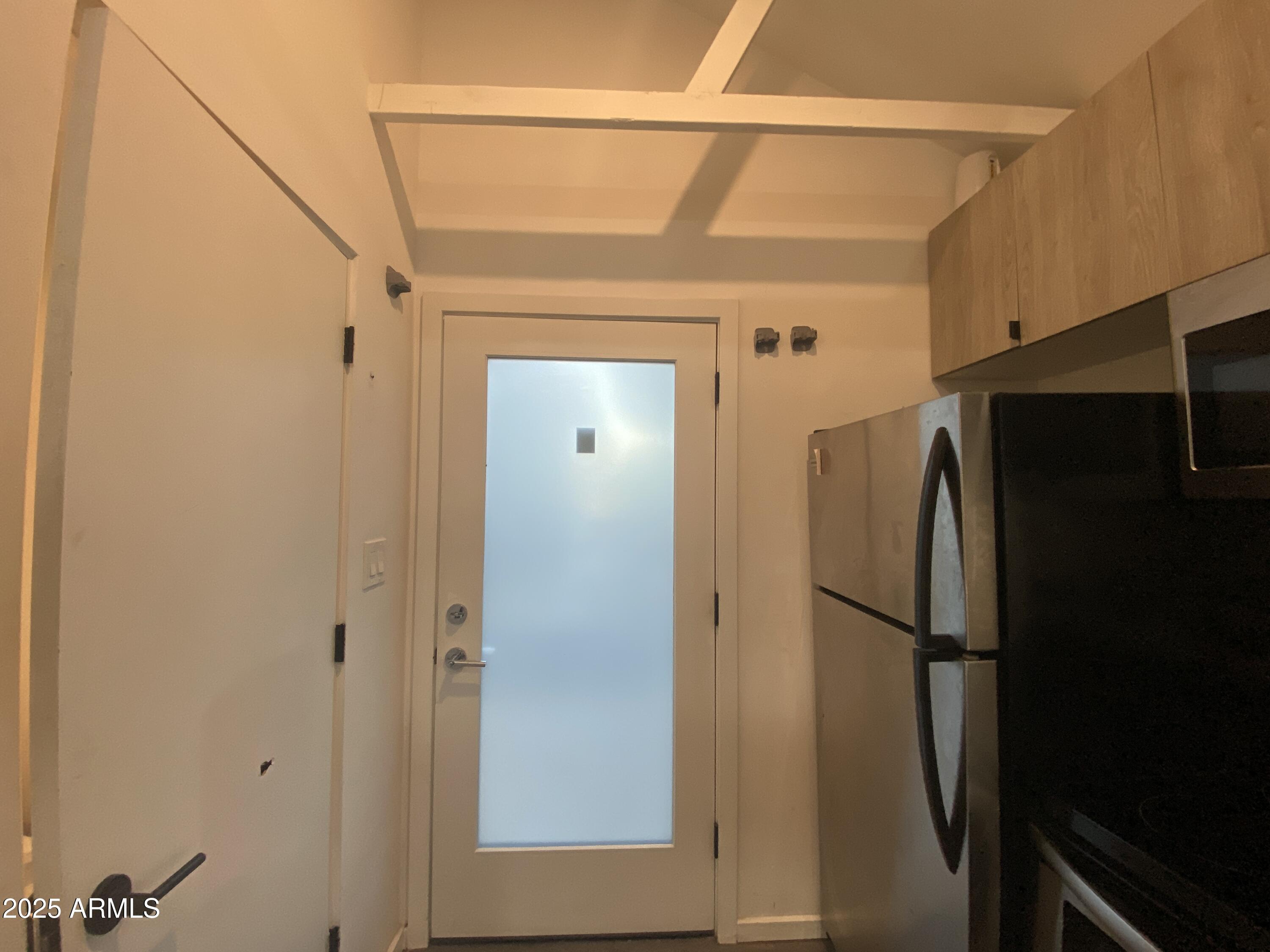 528 West Culver Street, Unit C Phoenix, AZ 85003 - Photo 4 of 5 a view of a refrigerator in kitchen