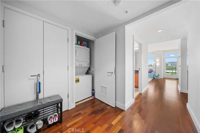 a bath room with a granite countertop sink mirror vanity and a bathtub