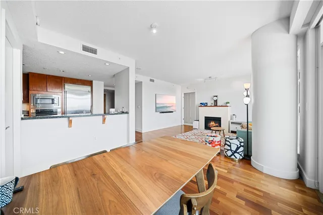 a spacious bedroom with a bed and a large window