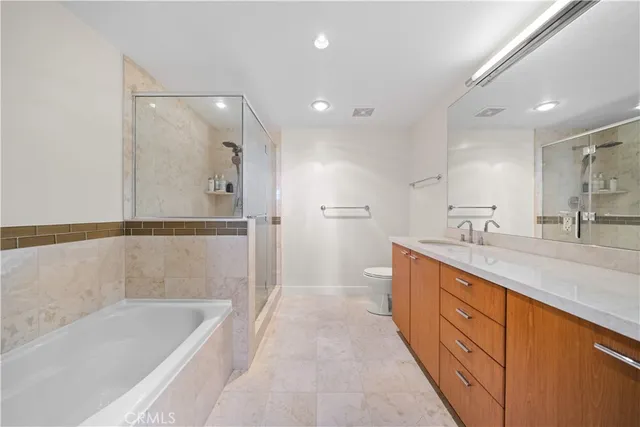 a view of a balcony with dining table and chairs