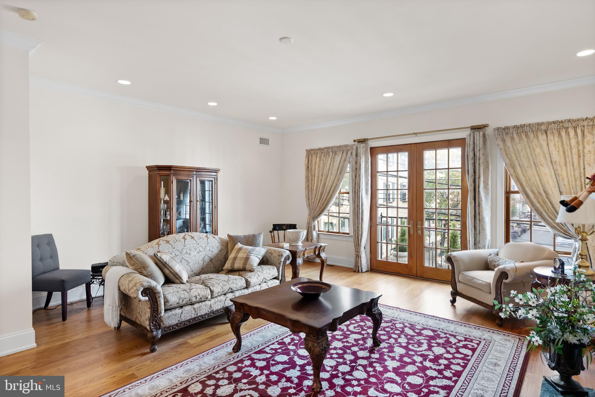 124 Bainbridge Street Philadelphia, PA 19147 - Photo 12 of 53 a living room with furniture and a large window
