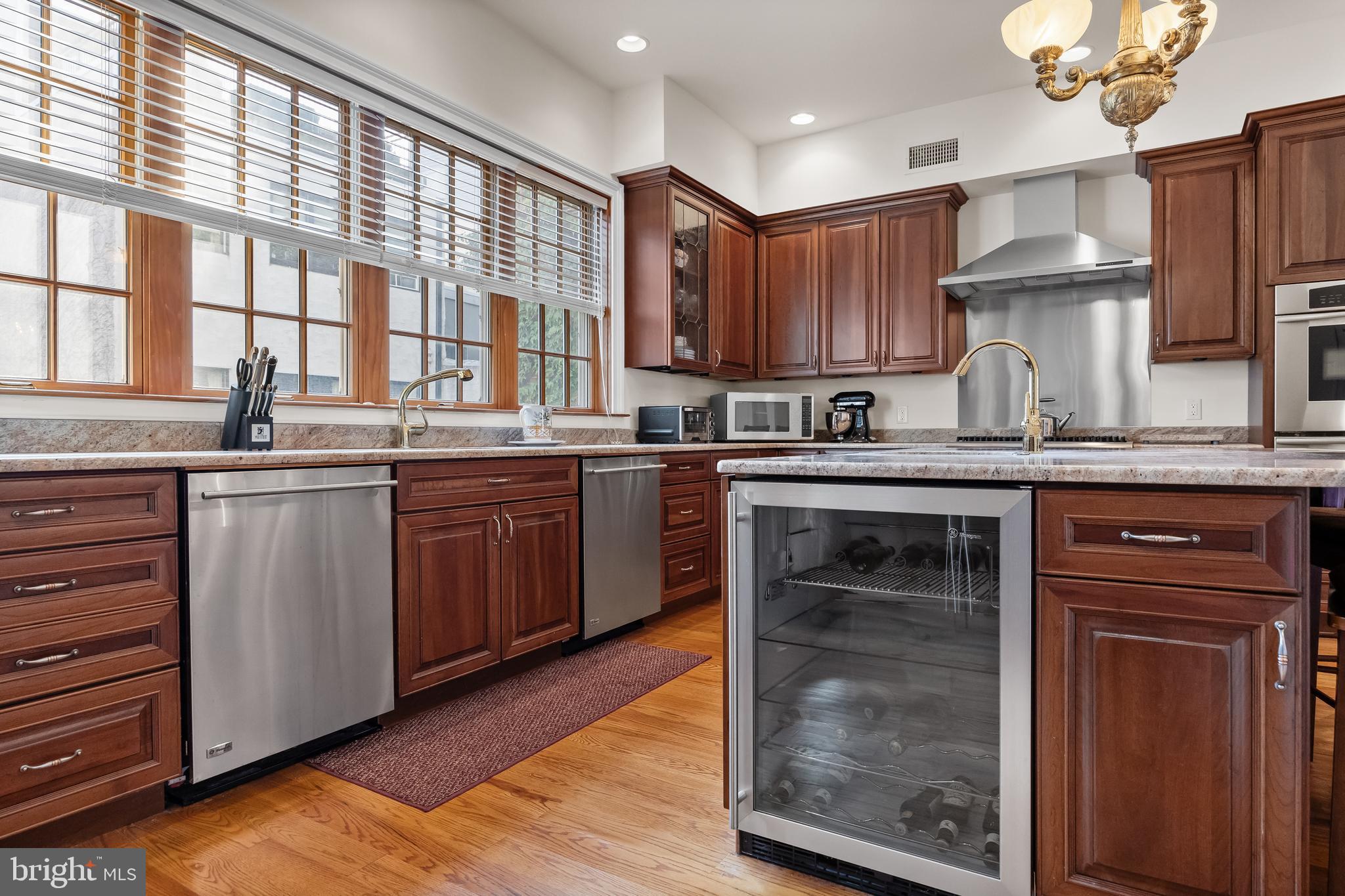 124 Bainbridge Street Philadelphia, PA 19147 - Photo 22 of 53 a kitchen with a sink cabinets and window